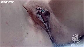 Girl enjoys toys in the bathtub