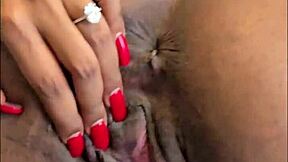 hot ebony girl fingers her pussy and plays with her pierced clit