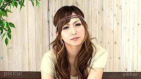 Kokoro's beautiful shaved pussy in close-up solo action.