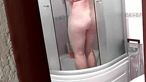Blonde milf cheats in shower with neighbor's doggystyle creampie.