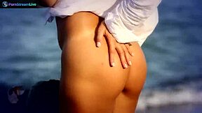 wow, check out busty brunette sensual jane fingering herself wildly at the beach!