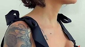 French brunette Lena teases with small tits