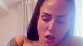 super horny tattooed brunette plays with dildos