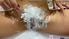 Close up of beautiful blonde shaving