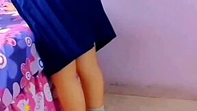 horny students fuck in the living room with family around.