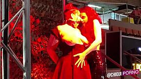 Fat spanish girl on public outdoor stage receives erotic wax treatment