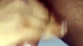 in this homemade scene, a hot young brunette gives a solo handjob to a big cock.