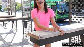 Flexible teen performs acrobatics outdoors