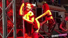 Fat spanish girl on public outdoor stage receives erotic wax treatment