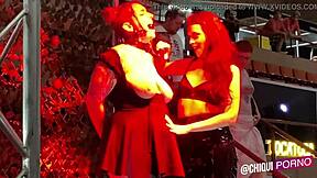 Fat spanish girl on public outdoor stage receives erotic wax treatment