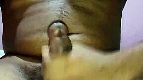 in this homemade scene, a hot young brunette gives a solo handjob to a big cock.