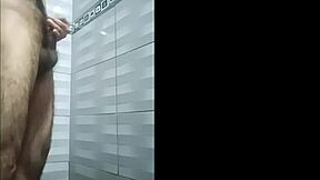 While waiting for my neighbor in the shower, I masturbate thinking of her.