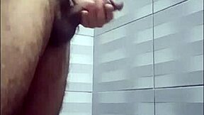 While waiting for my neighbor in the shower, I masturbate thinking of her.