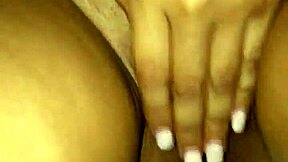 Getting her shaved pussy oiled and wet