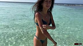 Girl gets pissed on at public beach and is shocked