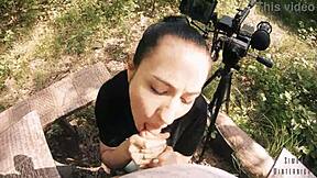 Intense POV blowjob in outdoor wilderness, swallowing cum mouthful.