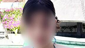 Powerful Display of Japanese Brunette in Blue Bikini