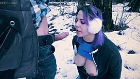 big-titted nerd gives public blowjob in the snow in the city park