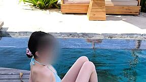 Powerful Display of Japanese Brunette in Blue Bikini