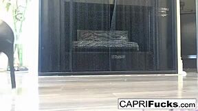 capri shows off her big tits and ass in high heels while masturbating