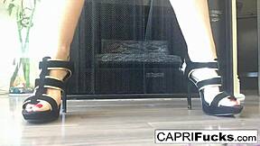 capri shows off her big tits and ass in high heels while masturbating