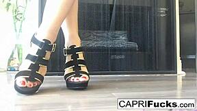 capri shows off her big tits and ass in high heels while masturbating