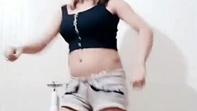 the indian girl dances seductively, shaking her big tits and ass