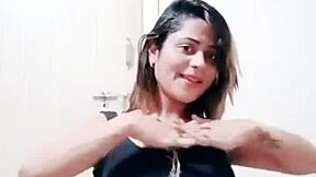 the indian girl dances seductively, shaking her big tits and ass