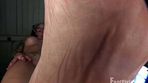 McKensie Displays Her Soles from Below in Detailed Leg Fetish View