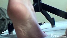 McKensie Displays Her Soles from Below in Detailed Leg Fetish View