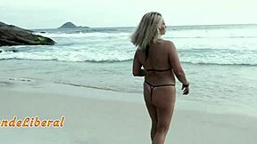 Blonde MILF in Micro Bikini Sucks Stranger's Cock on Beach