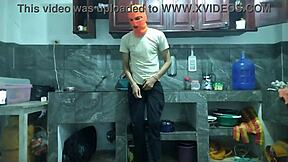 25-year-old man strokes big cock in kitchen