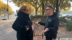 german milf with giant tits helps dumb lost american