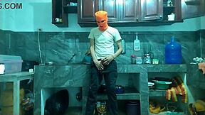 25-year-old man strokes big cock in kitchen