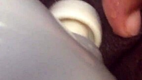 squirting ebony on the sofa with intense masturbation