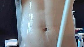 Muscular handsome man's shower time with cute brunette in solo masturbation