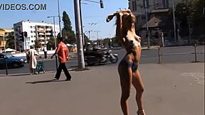 Blue Angel, Fully Body Painted, Strolls Through Public Streets in Exhibitionist Display. She Flashes Passersby Outdoors.