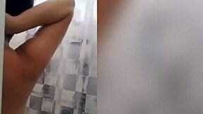 cute latina teen with tattoo bathing in the shower on webcam