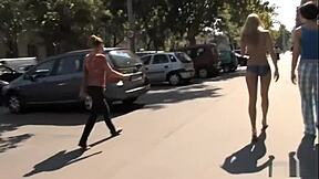 Blue Angel, Fully Body Painted, Strolls Through Public Streets in Exhibitionist Display. She Flashes Passersby Outdoors.