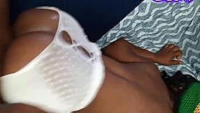 This pretty African woman gets bent over. She takes big black dick like a champ.