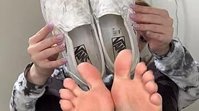 Serbian Girl Removes Sneakers To Show Bare Feet