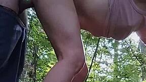 feeling thrilled as she sucks his dick in the woods with honks