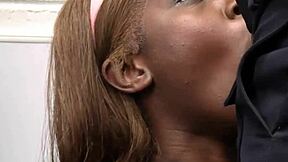 Teen obeys officer's demands in the shop.