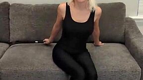 Model Poses In Black Bodysuit And Hunter Boots.