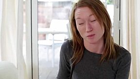 Tattooed women in a lesbian encounter.