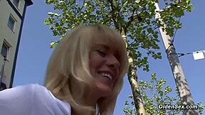 German Blonde MILF Masturbates Shaved Pussy On Casting Couch.