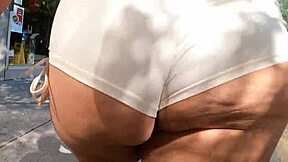 walking in public with mini shorts, flashing my ass to voyeurs