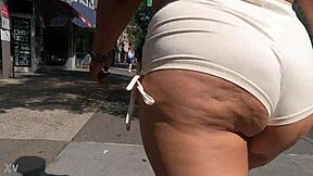 walking in public with mini shorts, flashing my ass to voyeurs