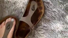 Barefoot girl in leather skirt on Friday