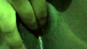 Black woman enjoys solo relaxation with wet elements in homemade session